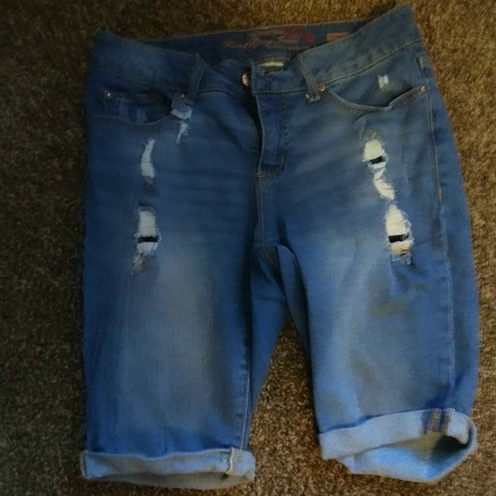 Light blue shorts with holes